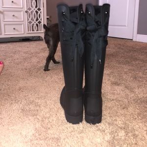 Matte black coach rain boots